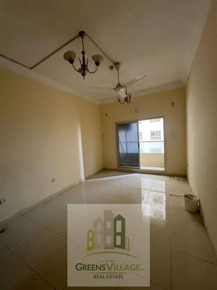 Affordable 1 BHK Flat with Balcony and Parking in Emirates City, Ajman